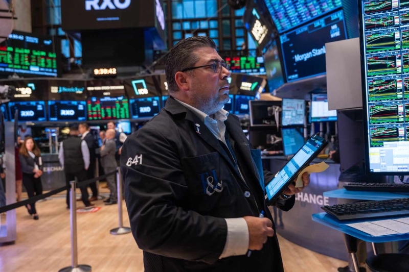 Dow Jones Today: Stocks Fall From Record Highs at the Start of a Big Week of Earnings Reports